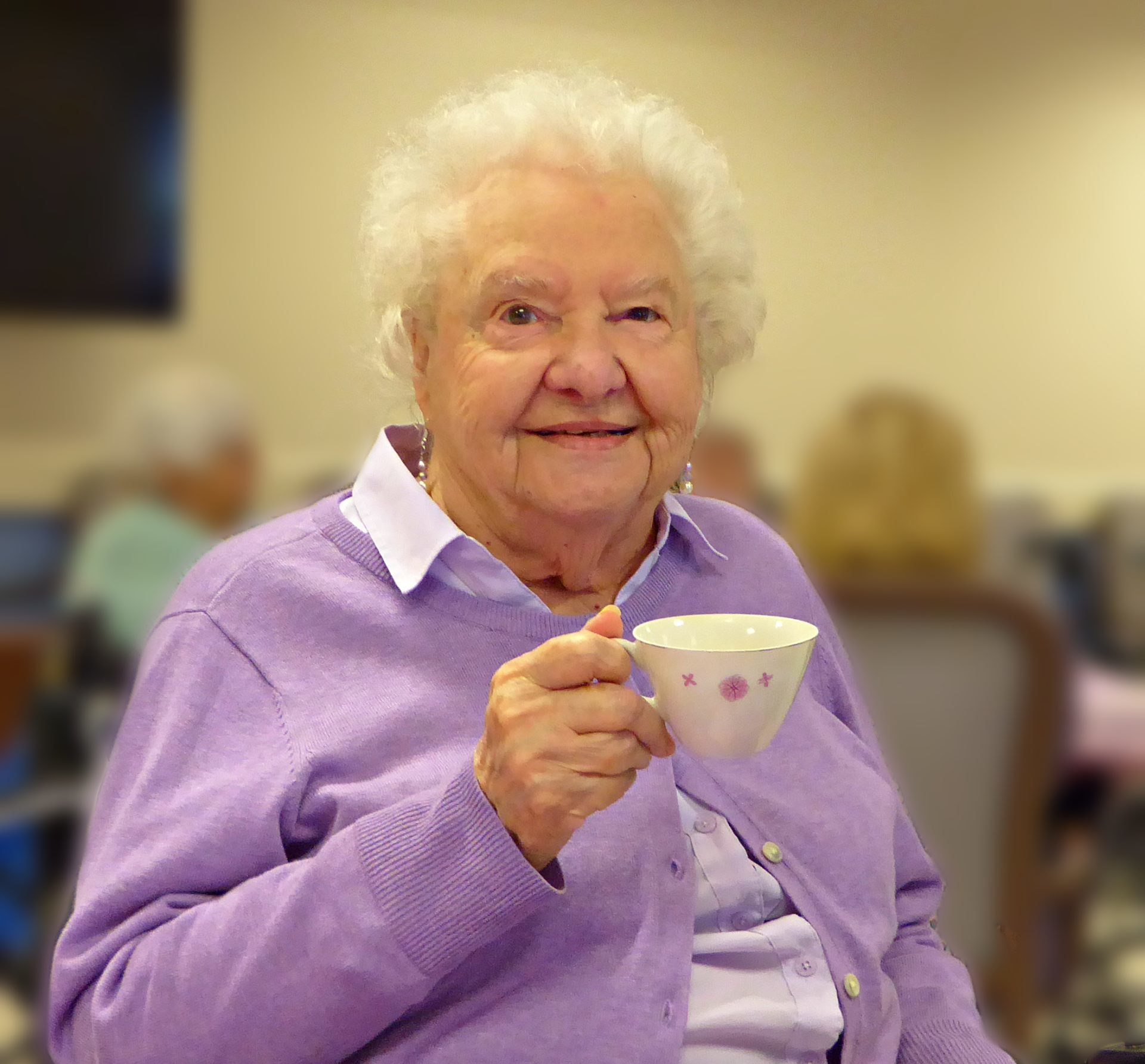 Resident at St. Patrick's Residence enjoys a cup of tea.